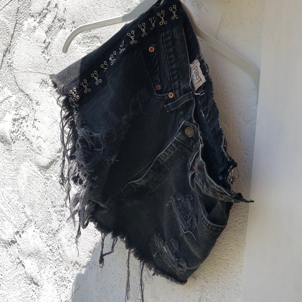 Distressed black high waisted shorts